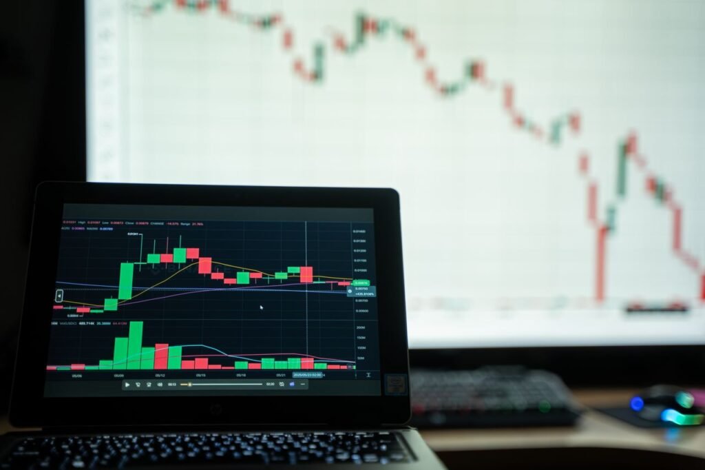 Mastering the First Impression: Your intriguing post title goes here Close-up of a laptop showing cryptocurrency market charts in a trading environment.